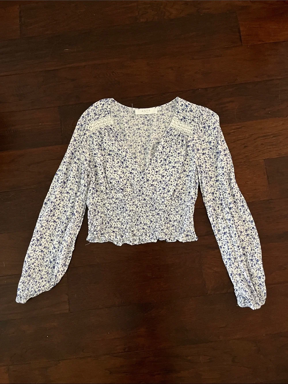 Astr Floral Long-Sleeve Smocked Crop Top in White and Blue